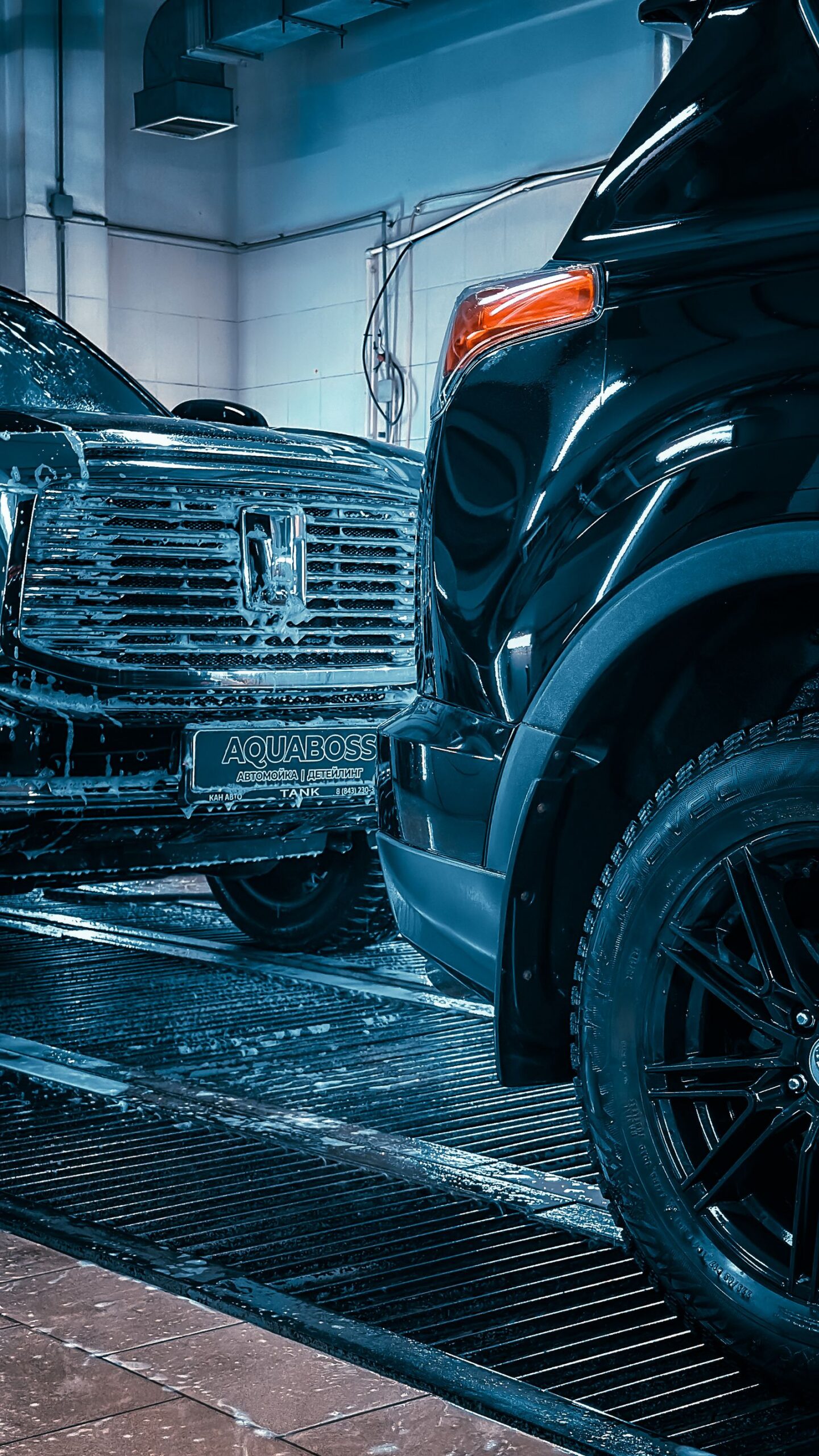 Luxury Cars in Modern Car Wash Facility