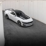 White Ford Mustang in Urban Setting