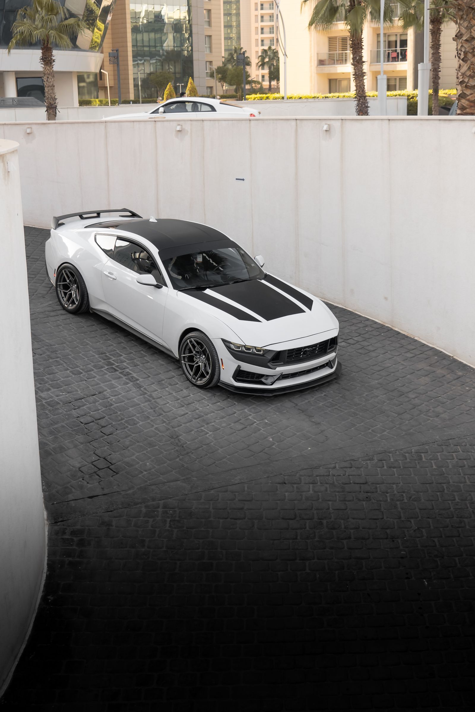 White Ford Mustang in Urban Setting