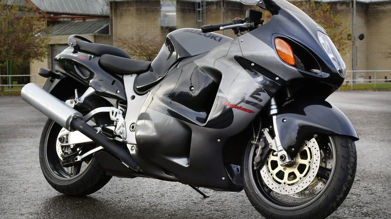 Suzuki GSX1300R Hayabusa parked on wet pavement