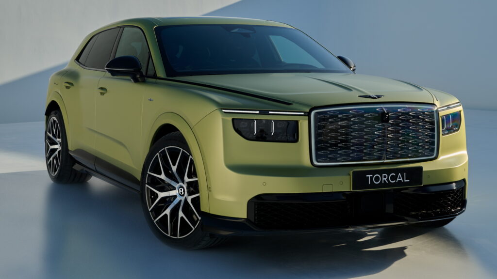 Pale green Bentley Torcal SUV in studio, front three-quarter view