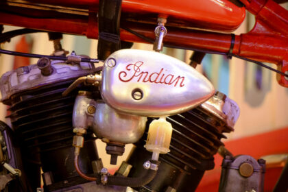 Close-up of vintage Indian motorcycle engine with Indian script logo Close-up of vintage Indian motorcycle engine with Indian script logo