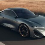 Silver Peugeot RCZ Vision sports car driving on a road