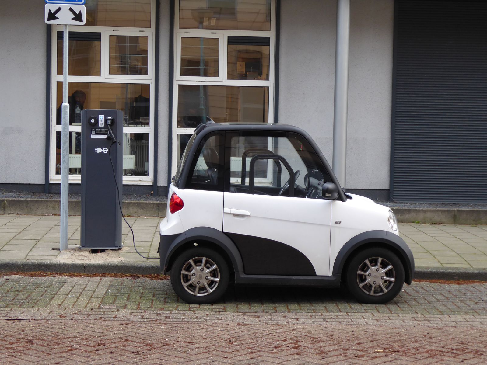 Compact Electric Car Charging at Station