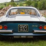 Ferrari Dino GT Parked on Green Grass Field
