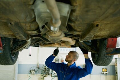 A Man Repairing a Vehicle