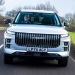 Silver JAECOO SUV driving on a rural road