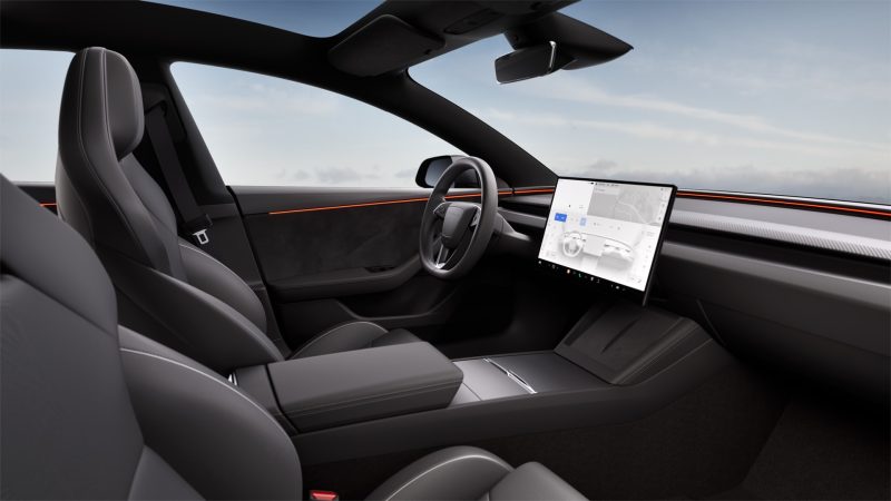 Tesla Model 3 interior with large central touchscreen
