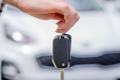 Person Holding a Car Key