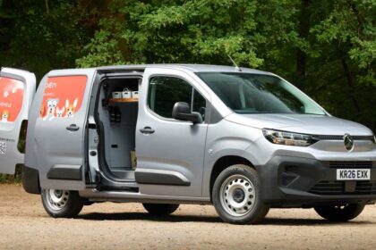 Silver Citroen Pawlingo concept van with dog graphics and open doors