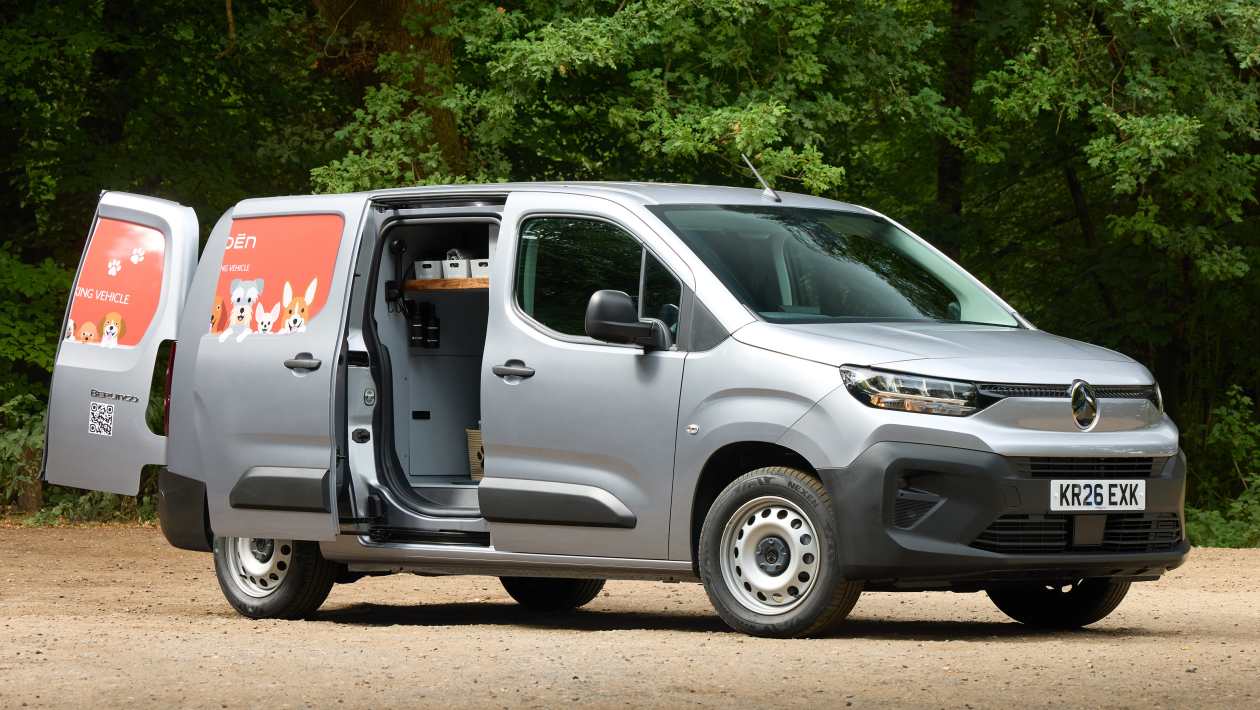 Silver Citroen Pawlingo concept van with dog graphics and open doors