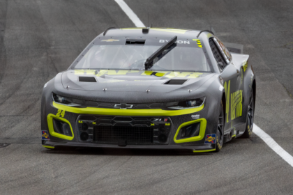 Black Chevrolet Camaro Driving on a Race Track